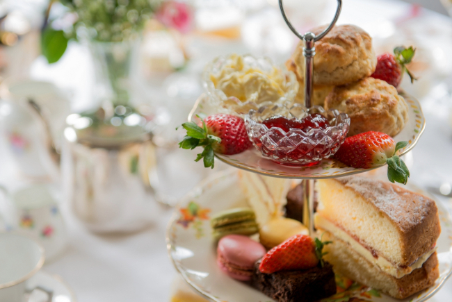 Plates showing cakes and delicious treats as part of the Afternoon Tea